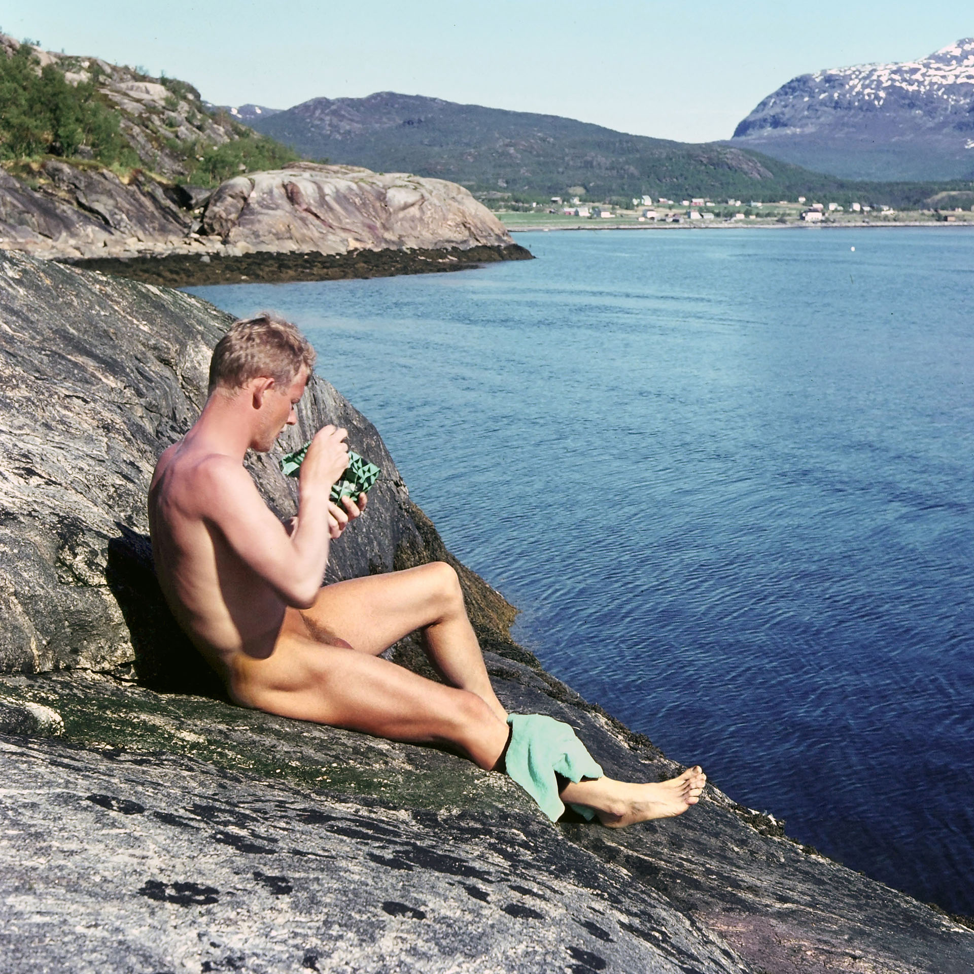 Naturism, naked and free in nature - Naked man on a trip to the north, Scandinavia, Norway